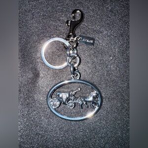 Metallic Keychain with Carriage Motif